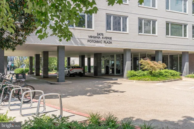 a view of a building with sitting area