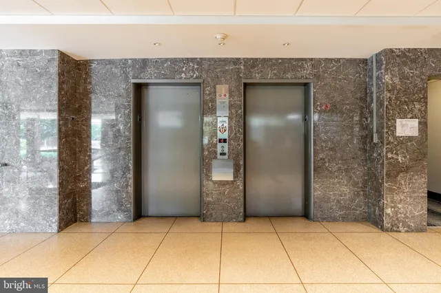 a view of entryway with a brick wall