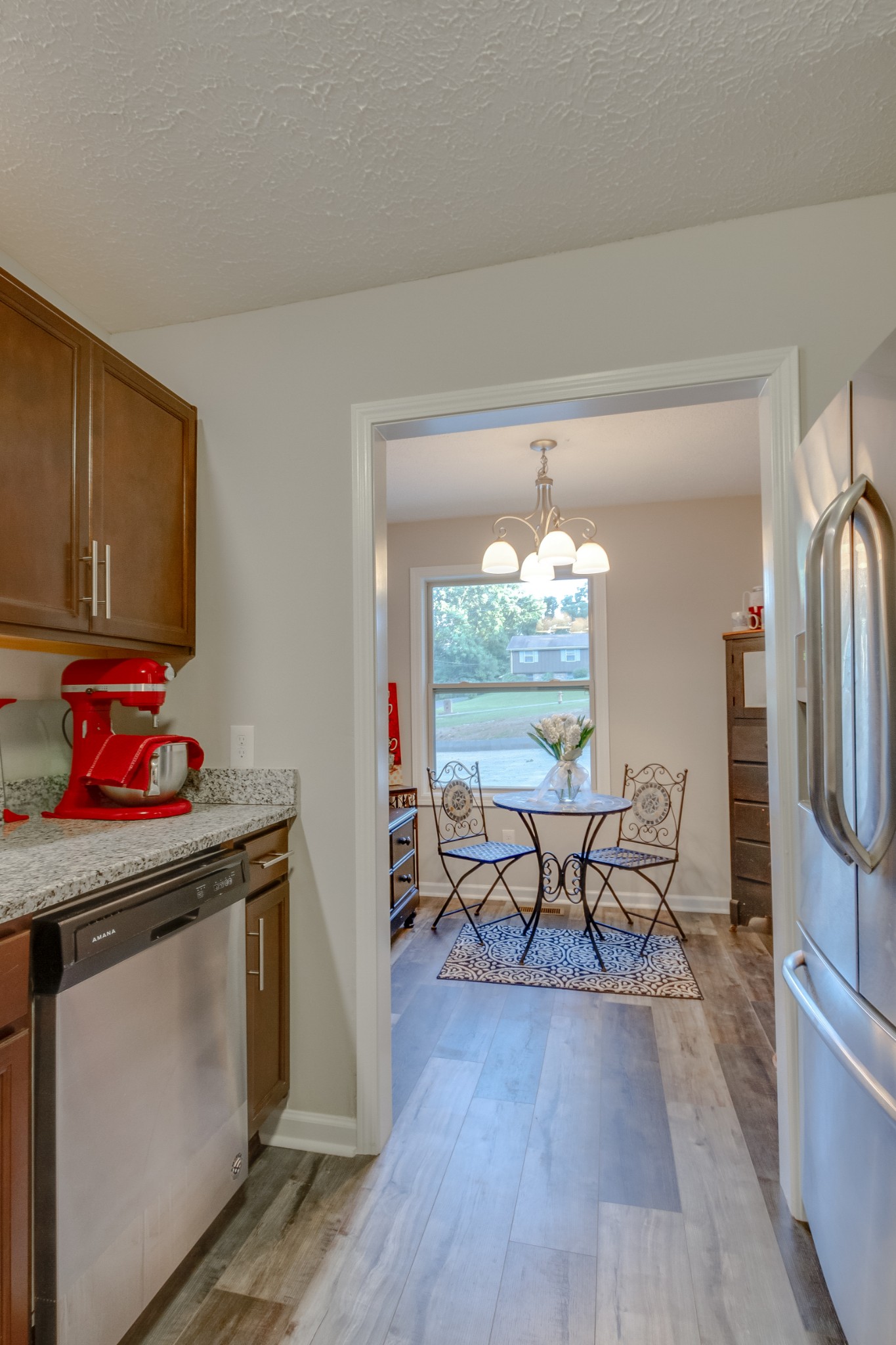 520 Bryan Road Clarksville, TN 37043 - Photo 17 of 56 a room that has a table chair and a wooden floor