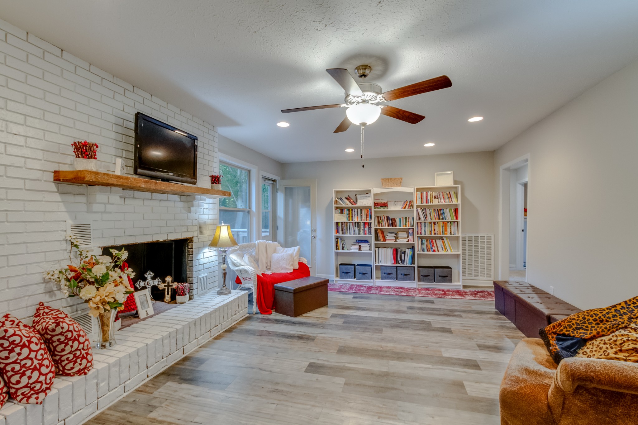520 Bryan Road Clarksville, TN 37043 - Photo 20 of 56 a living room with furniture a flat screen tv and a fireplace
