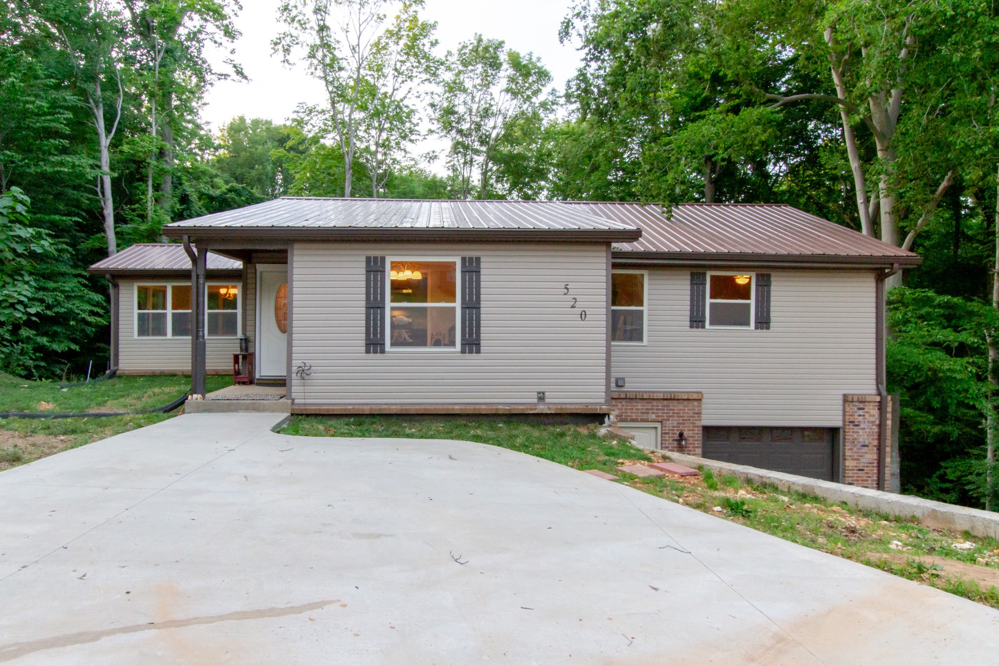 520 Bryan Road Clarksville, TN 37043 - Photo 4 of 56 a front view of a house with a yard