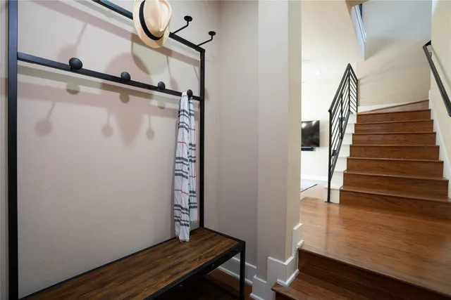 a kitchen with stainless steel appliances granite countertop a sink refrigerator and microwave