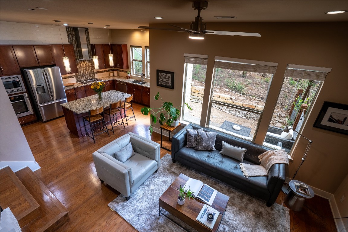 8110 Ranch Road 2222, Unit 45 Austin, TX 78730 - Photo 13 of 38 a living room with furniture and a large window