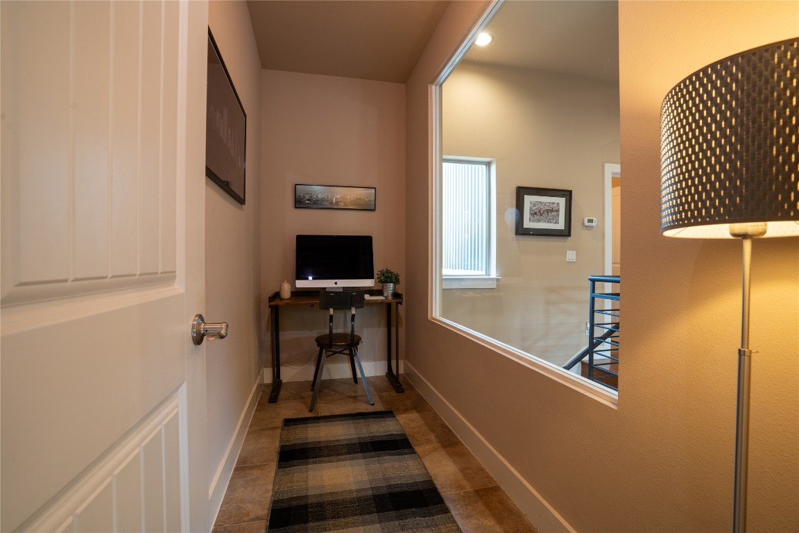 8110 Ranch Road 2222, Unit 45 Austin, TX 78730 - Photo 16 of 38 a view of a hallway with seating area