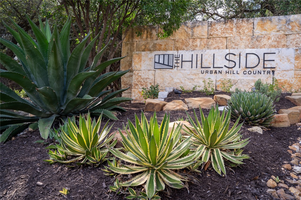 8110 Ranch Road 2222, Unit 45 Austin, TX 78730 - Photo 2 of 38 a view of a street with a sign on a wall
