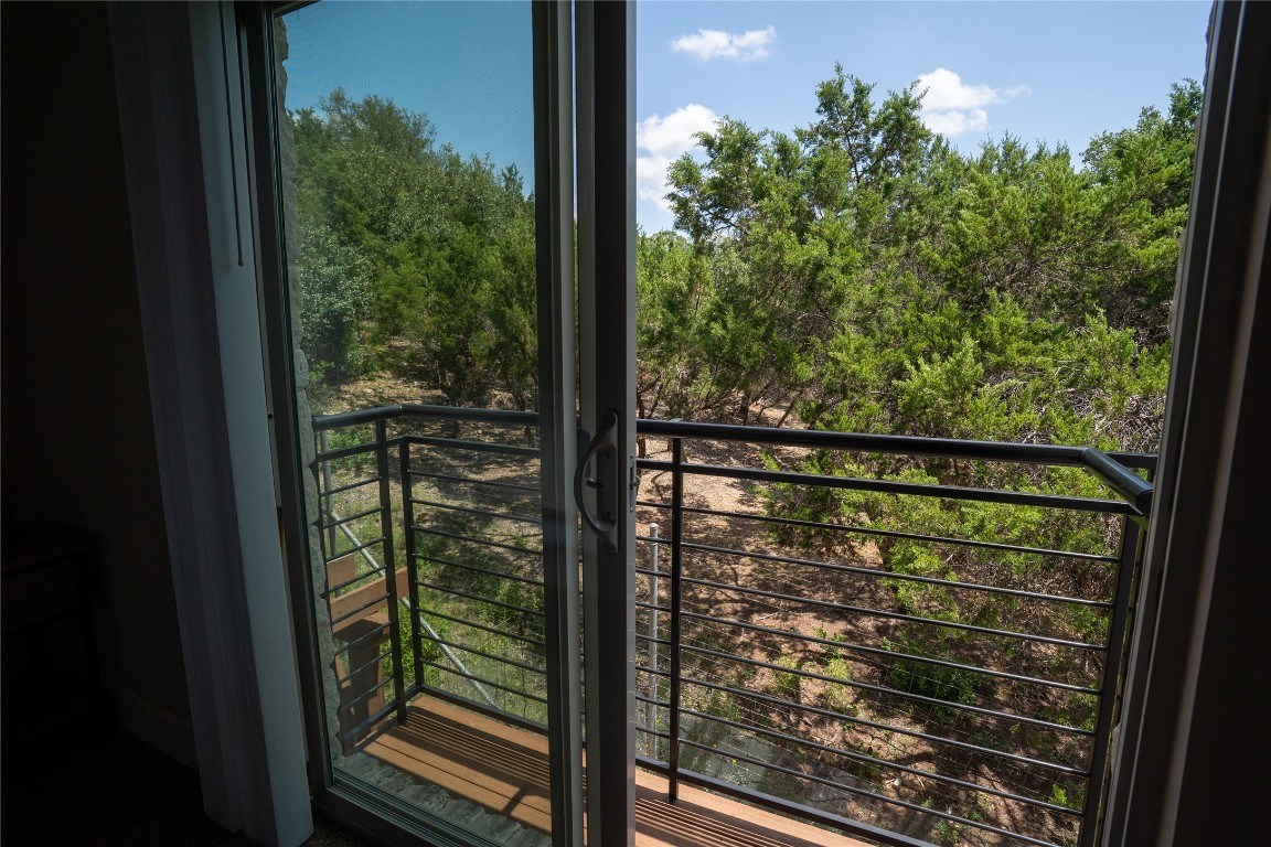 8110 Ranch Road 2222, Unit 45 Austin, TX 78730 - Photo 27 of 38 a view of a glass door