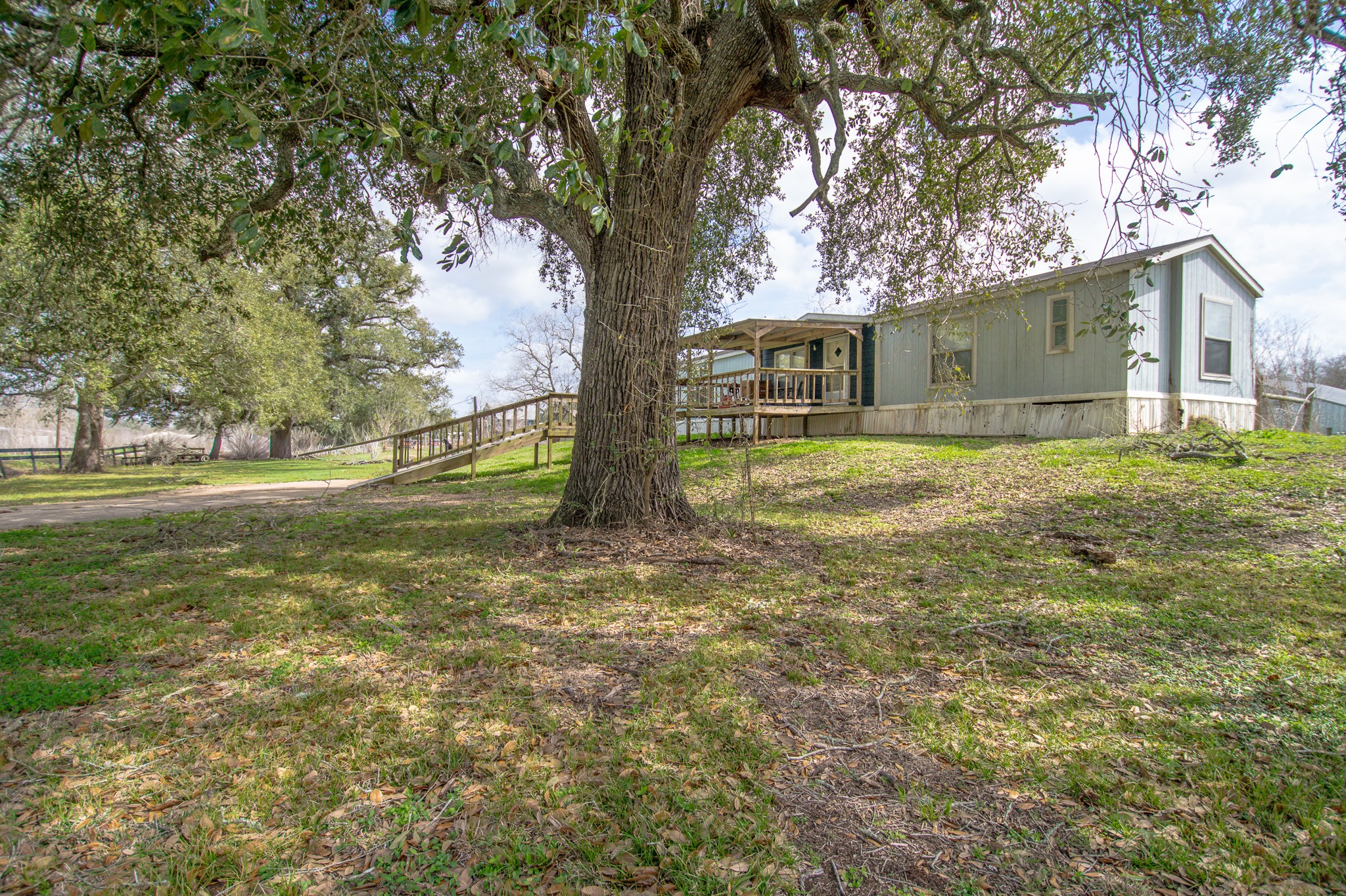 2801 County Road 444 Angleton, TX 77515 - Photo 1 of 37 a view of a house with a yard