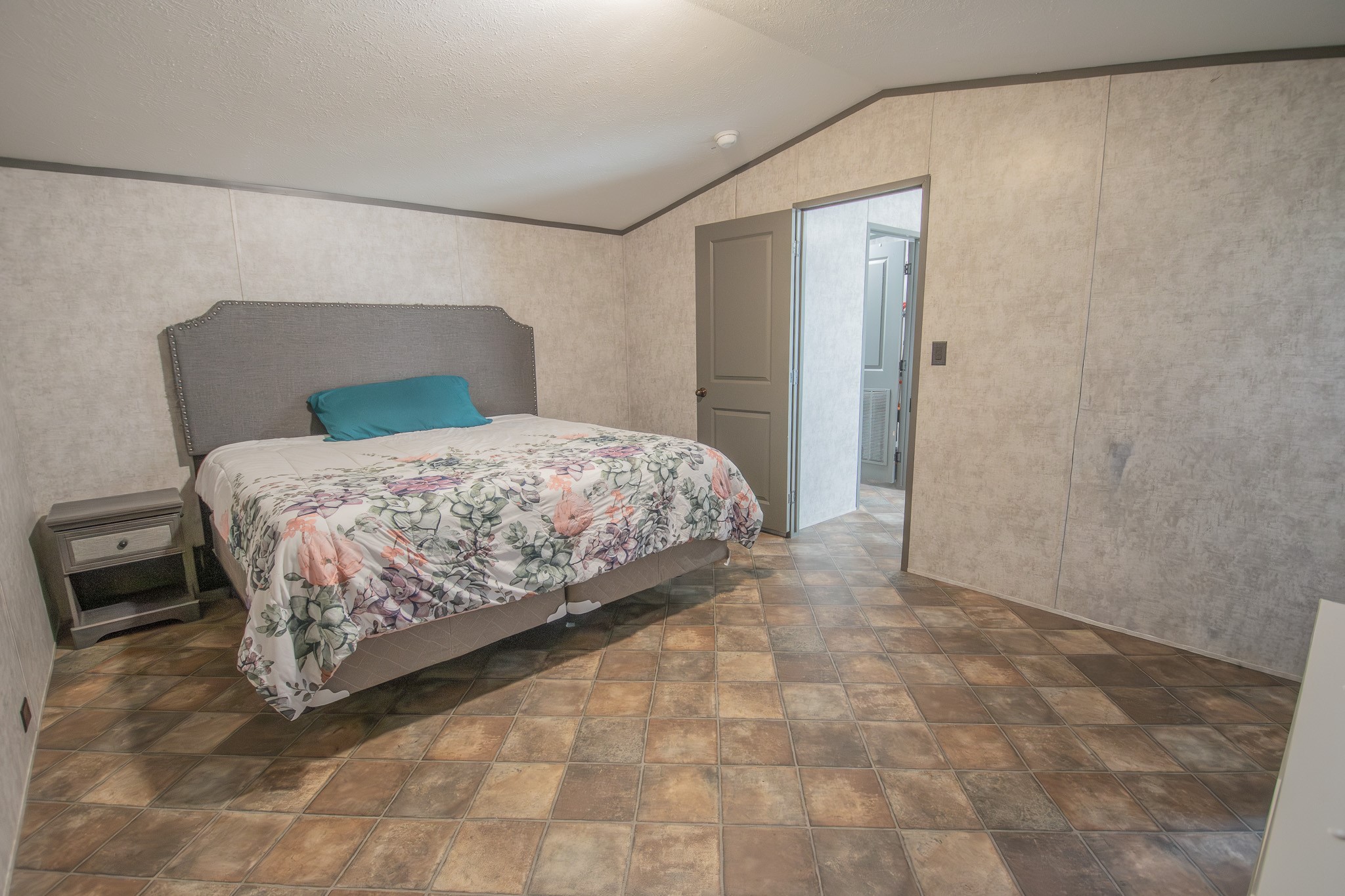 2801 County Road 444 Angleton, TX 77515 - Photo 14 of 37 a bedroom with a bed and a cabinets