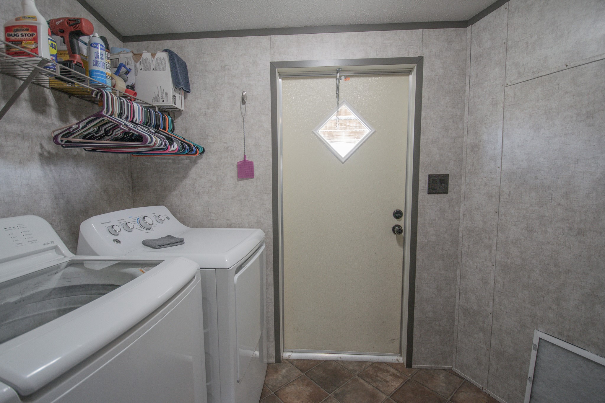 2801 County Road 444 Angleton, TX 77515 - Photo 18 of 38 a utility room with dryer and washer