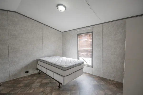 a bathroom with a sink toilet and a mirror