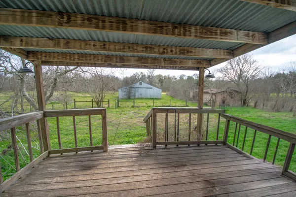 a view of outdoor space with wooden deck