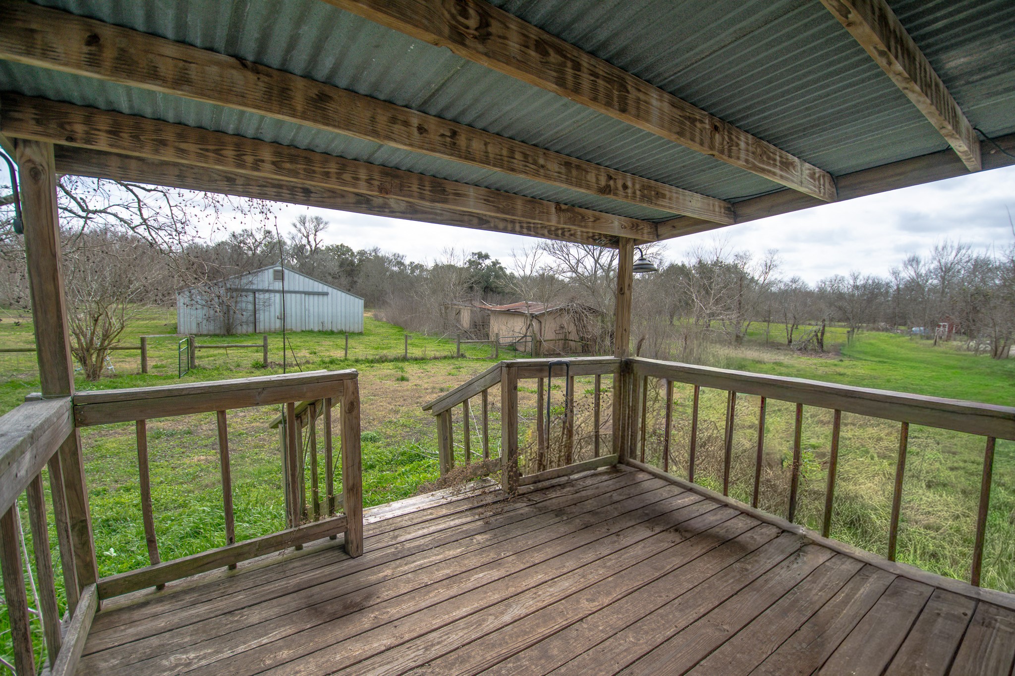 2801 County Road 444 Angleton, TX 77515 - Photo 25 of 38 a view of outdoor space with wooden deck