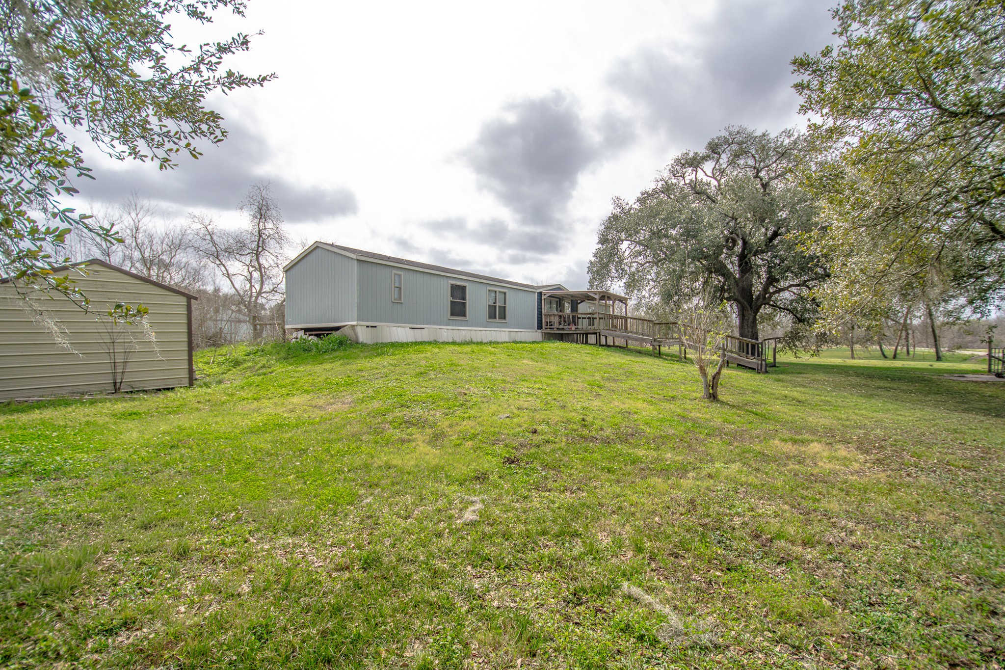 2801 County Road 444 Angleton, TX 77515 - Photo 35 of 38 a view of a house with a yard