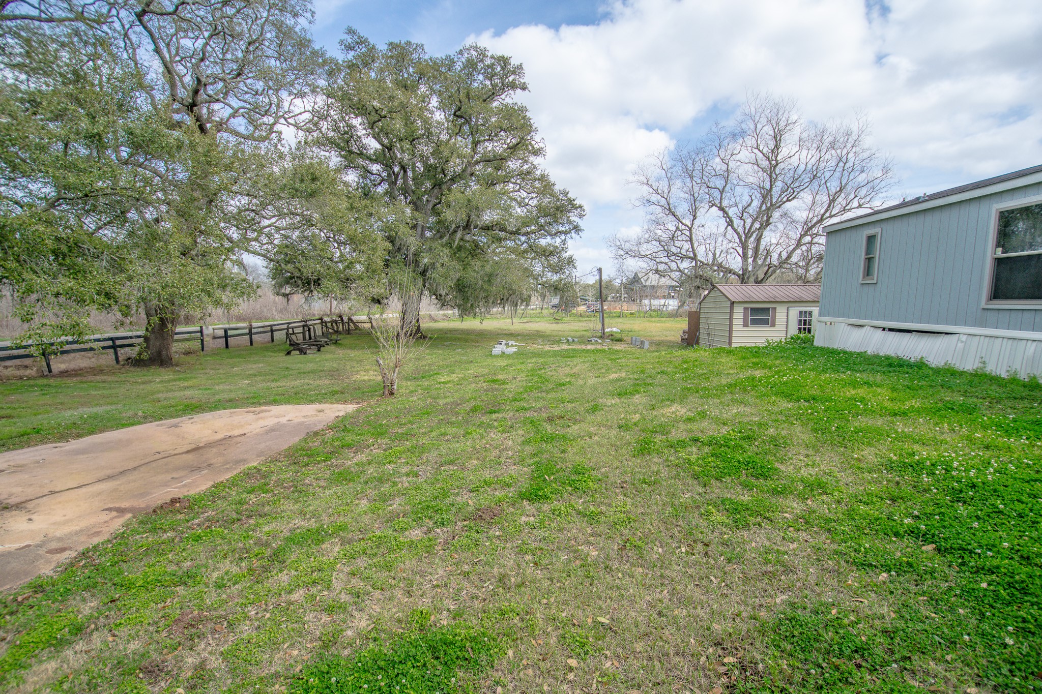 2801 County Road 444 Angleton, TX 77515 - Photo 4 of 38 a view of a park with large trees