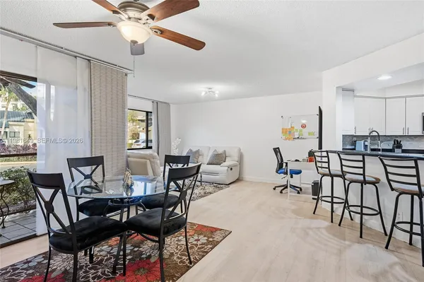 a view of a dining room with furniture