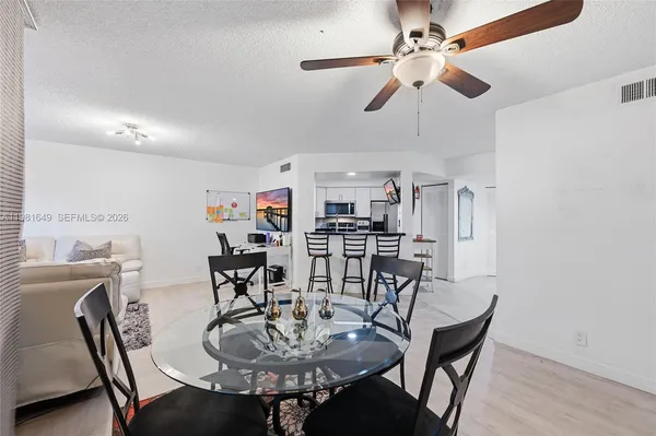 a view of a dining room with furniture