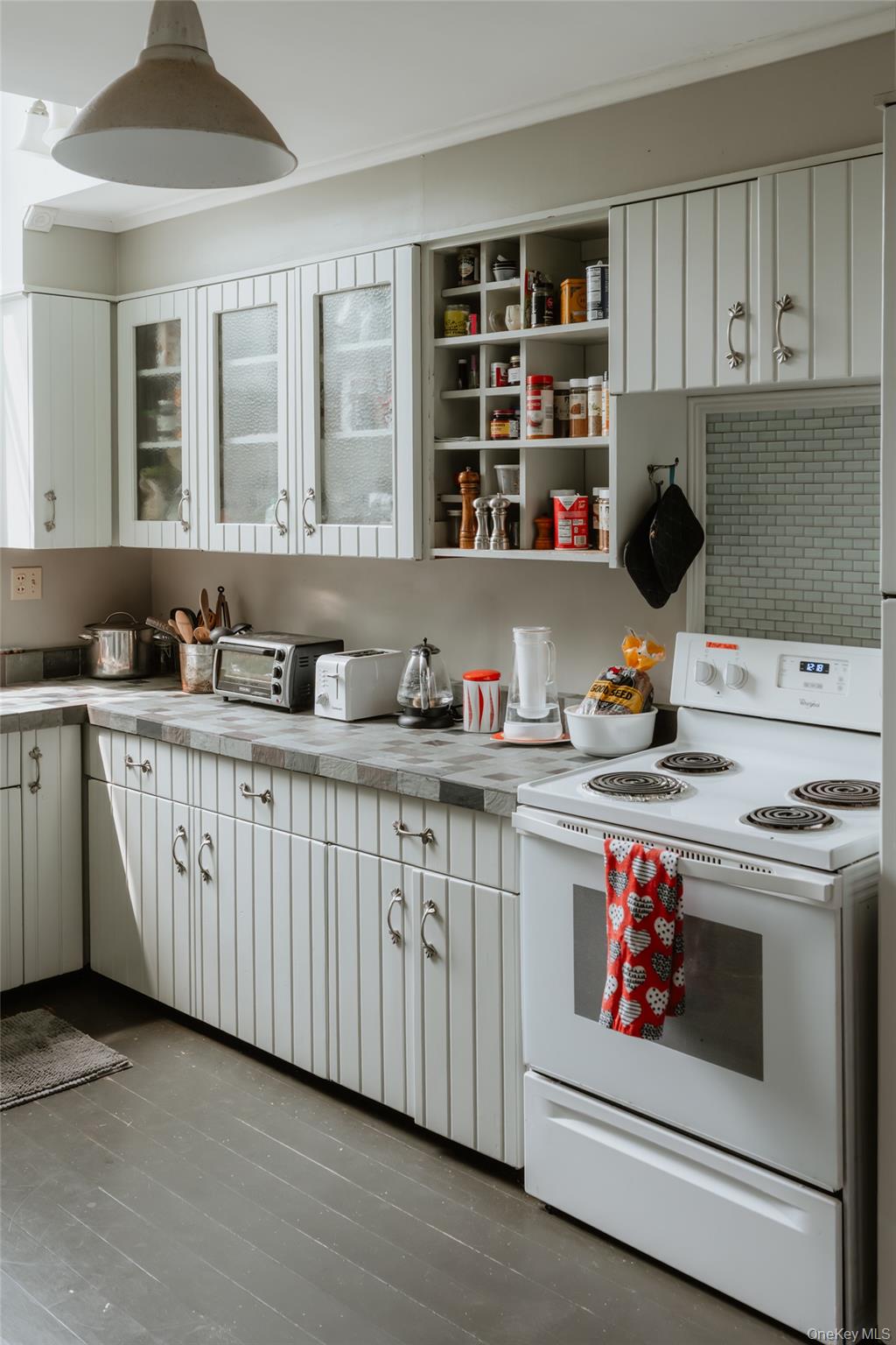 48 Upper Main Street Callicoon, NY 12723 - Photo 35 of 48 Kitchen featuring white range with electric cooktop, white cabinets, open shelves, and tile counters