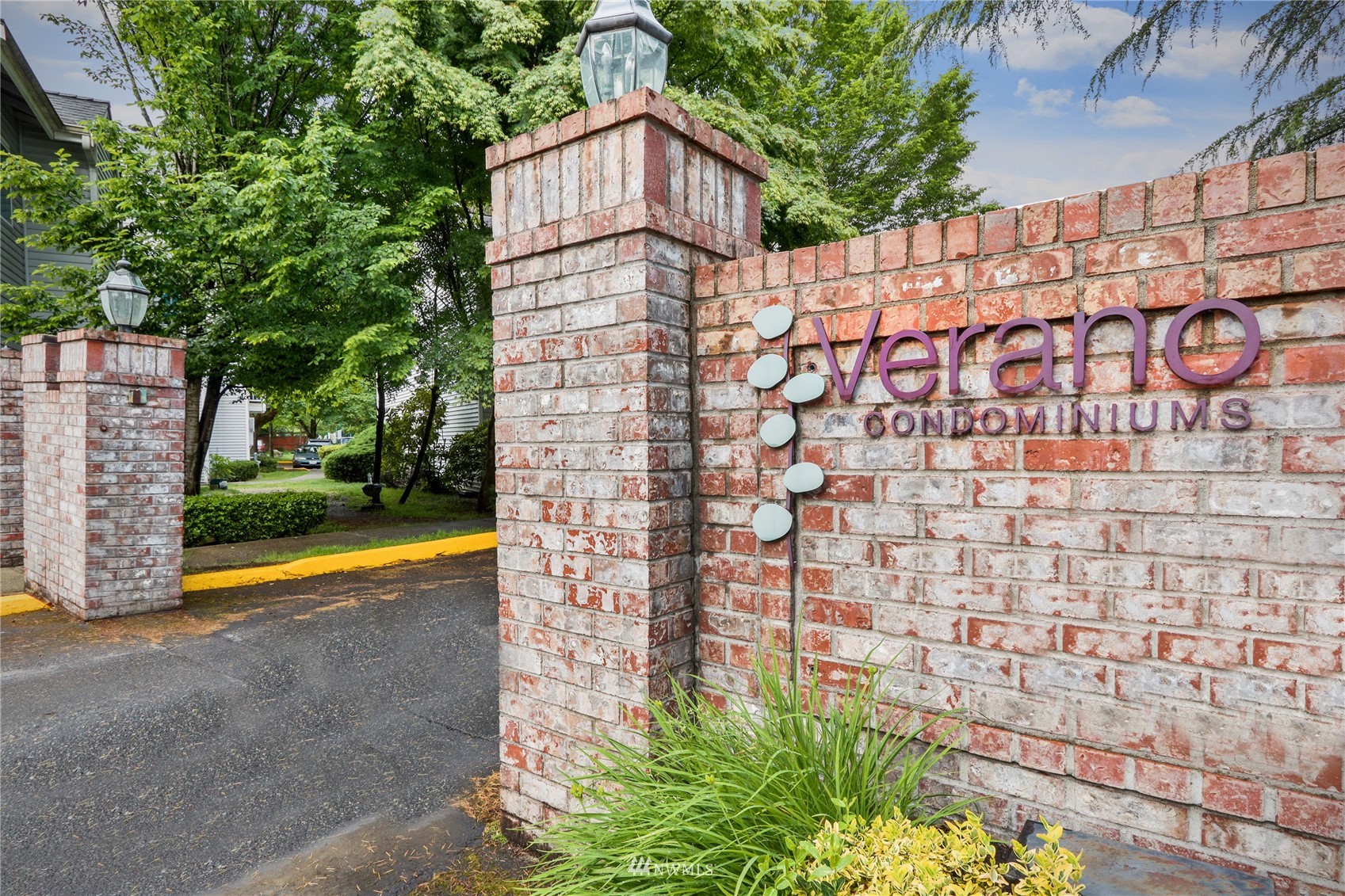 9805 Avondale Road Northeast, Unit R150 Redmond, WA 98052 - Photo 2 of 23 a view of brick wall and building