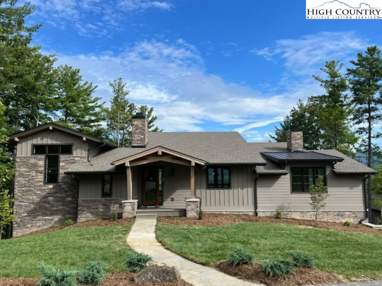 637 Red Cedar Road Boone, NC 28607 - Photo 1 of 7 a front view of a house with a yard