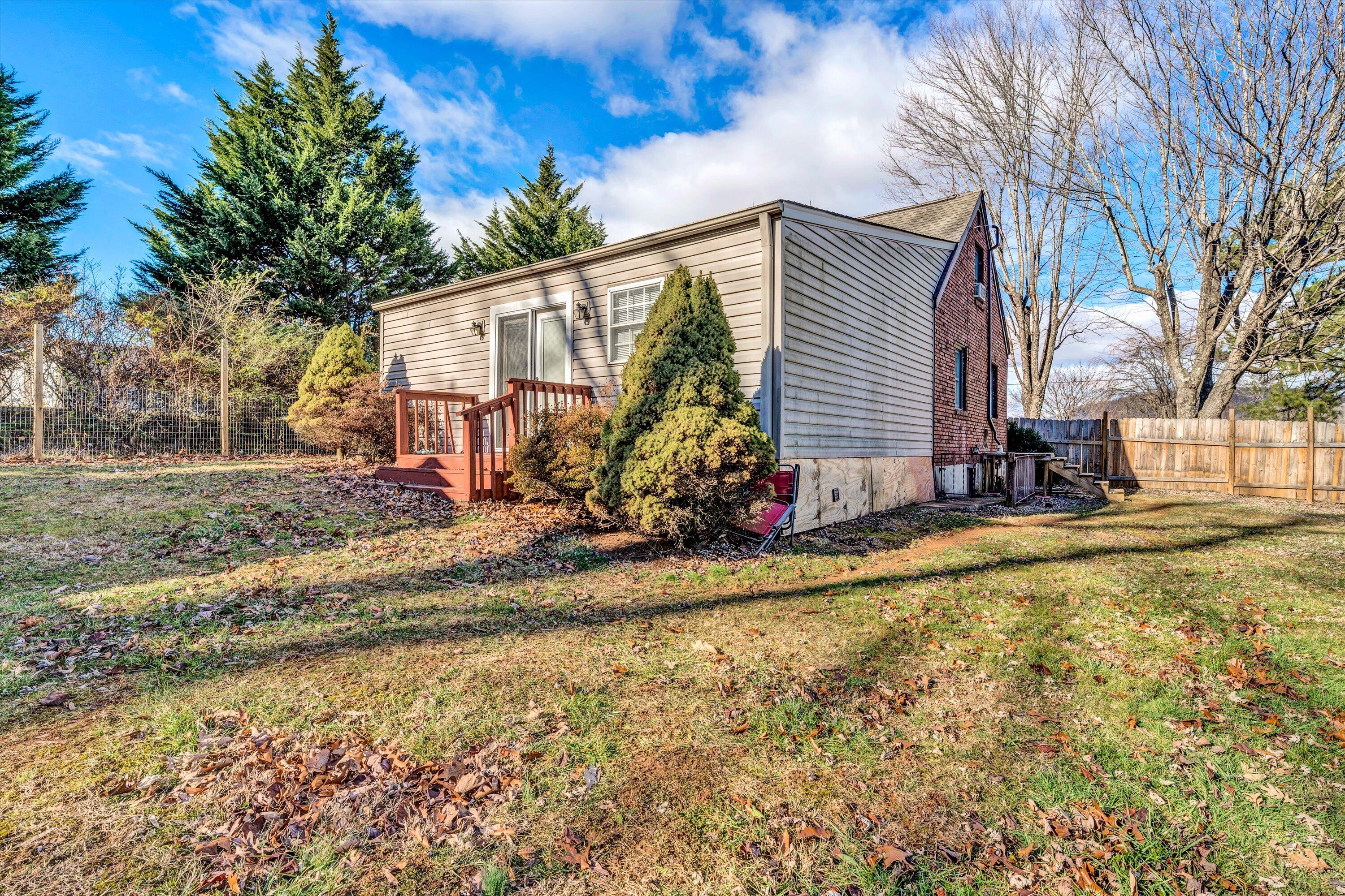 1120 Turner Branch Road Goodview, VA 24095 - Photo 28 of 35 a view of a house with backyard and sitting area