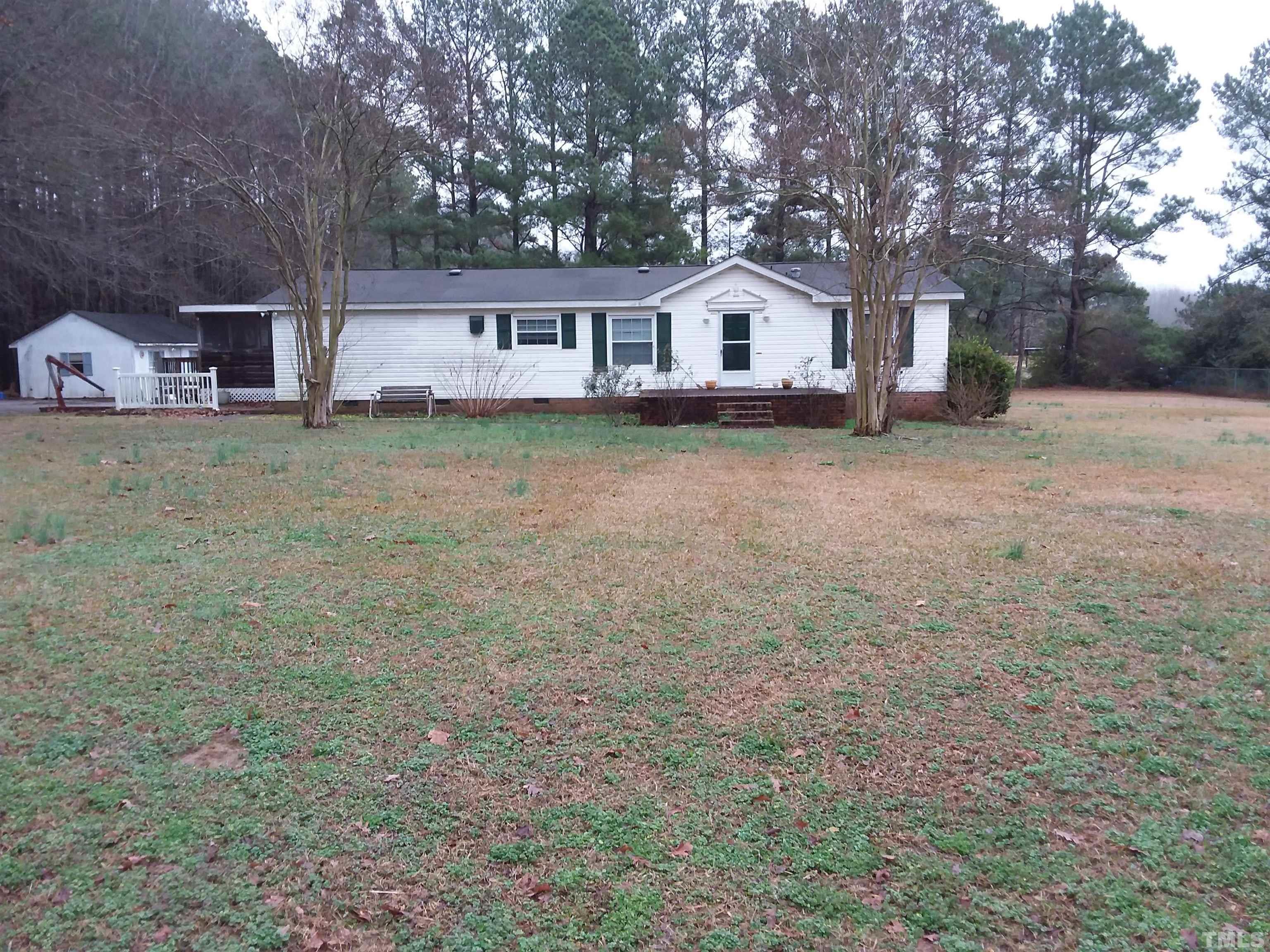 4644 Dusty Road Raleigh, NC 27610 - Photo 2 of 12 a view of house with outdoor space