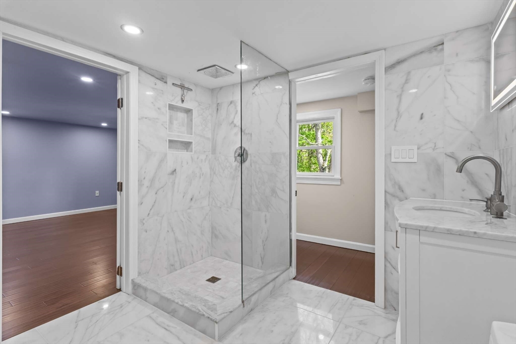 7 Darrow Street Worcester, MA 01606 - Photo 28 of 42 a bathroom with a shower and a sink