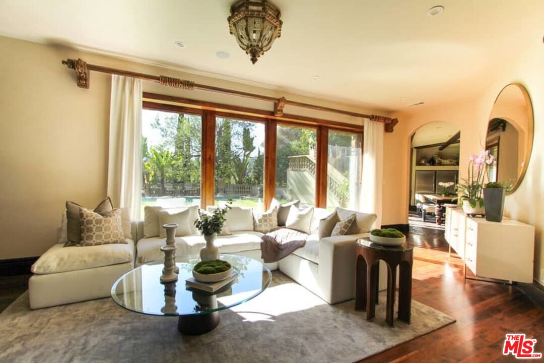 1016 Moraga Drive Los Angeles, CA 90049 - Photo 9 of 30 a living room with furniture