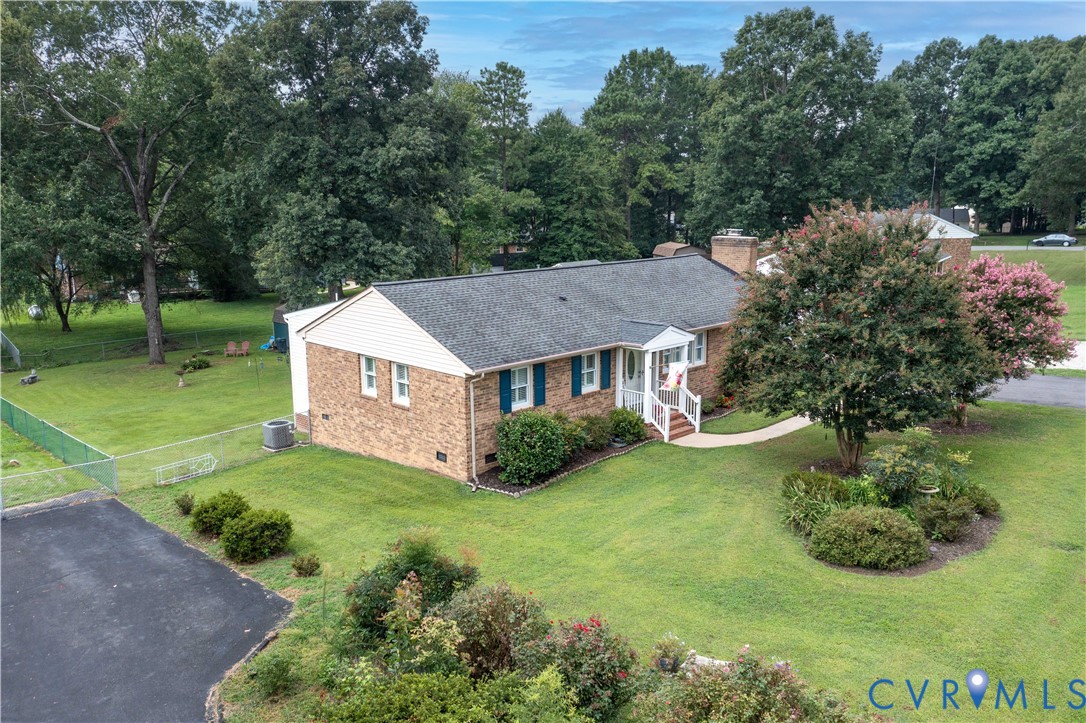11407 Delgado Road Midlothian, VA 23112 - Photo 1 of 35 an aerial view of a house having yard