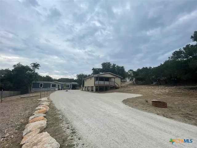 a view of swimming pool with a yard