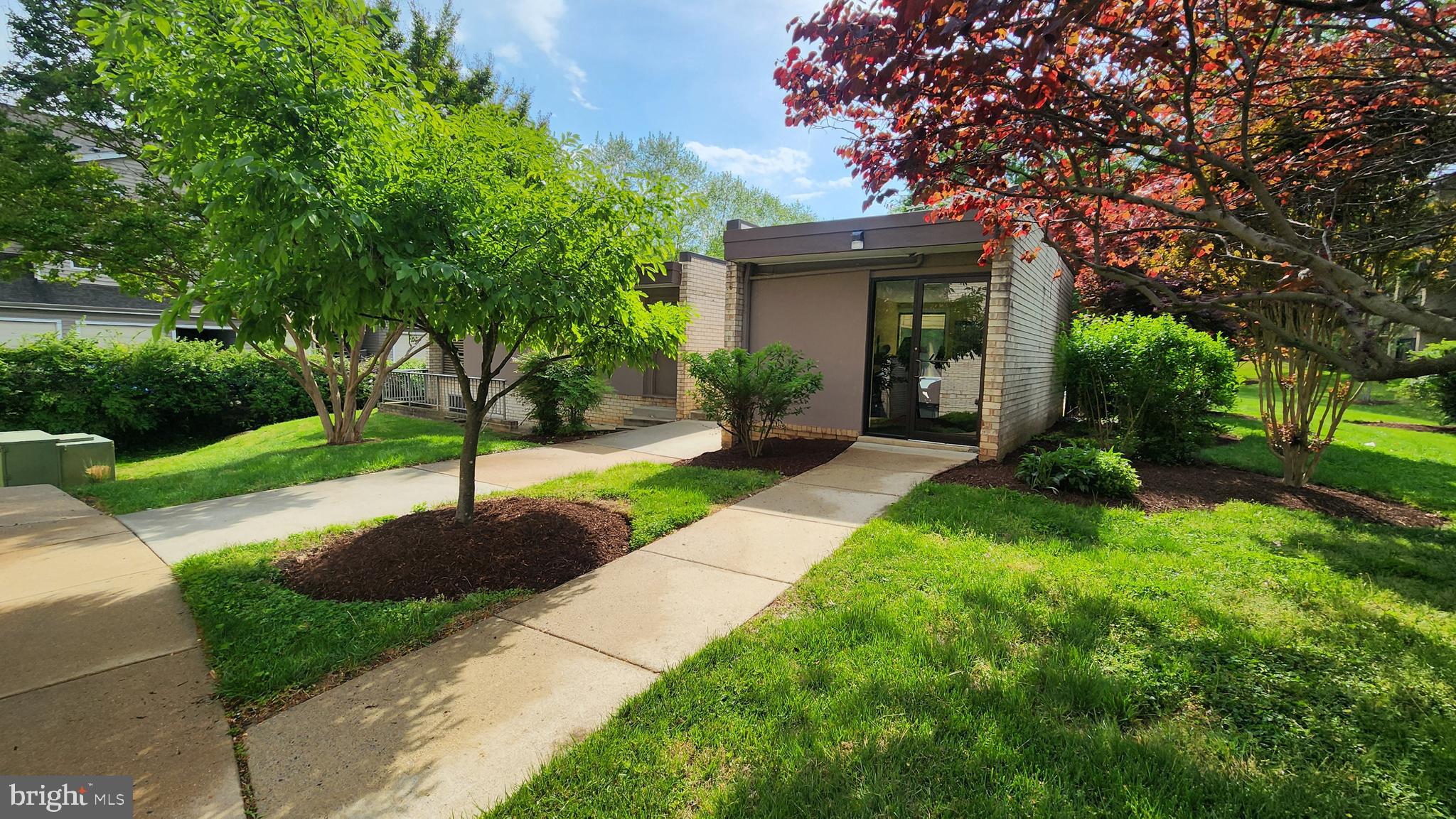 10862 Bucknell Drive, Unit 301 Silver Spring, MD 20902 - Photo 24 of 32 Walkway to fitness center