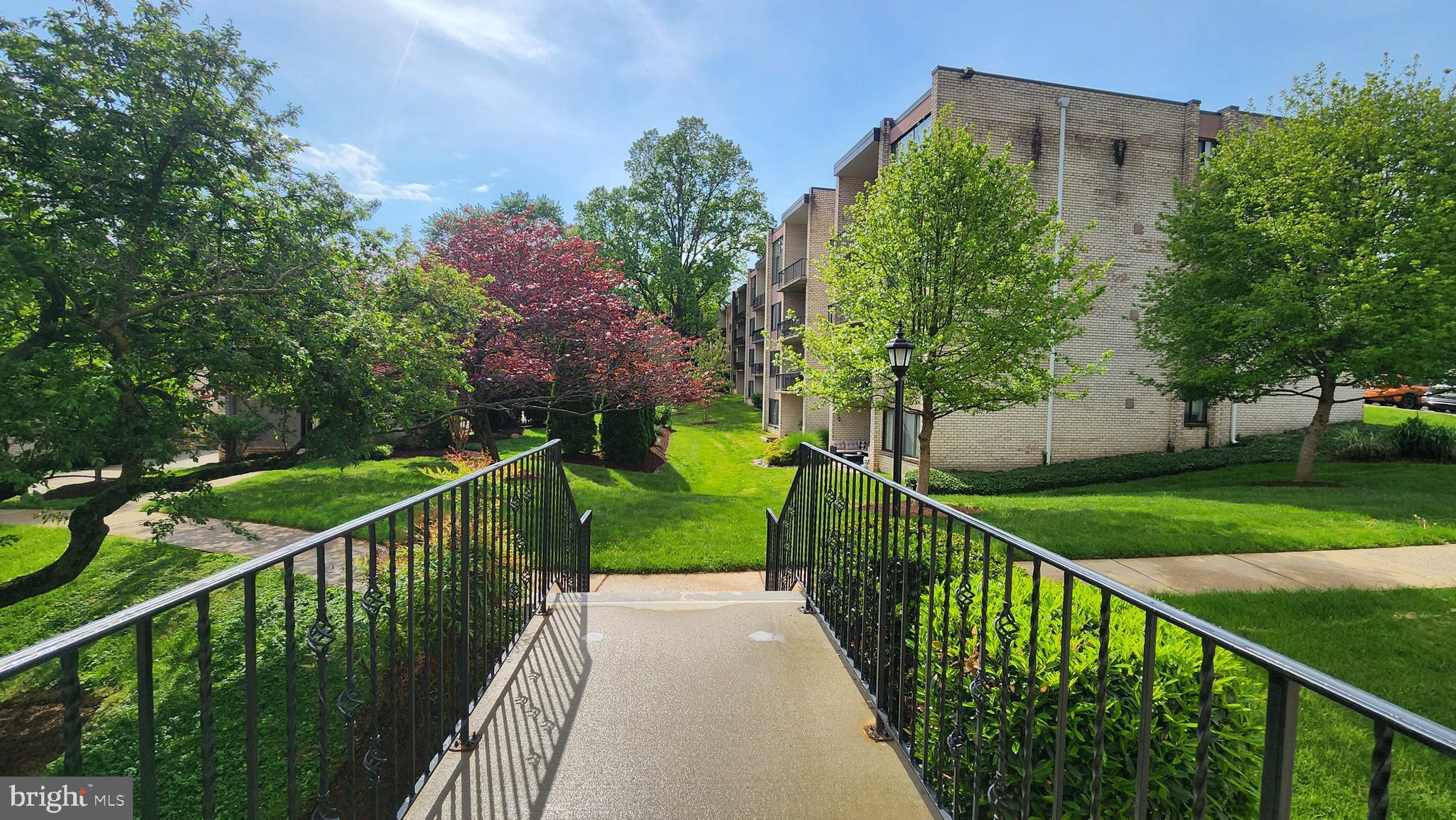 10862 Bucknell Drive, Unit 301 Silver Spring, MD 20902 - Photo 26 of 32 Walkway- Beautiful landscaping