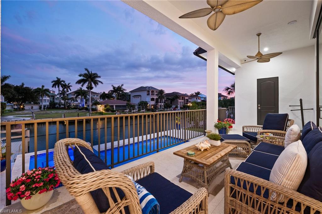 388 Pine Avenue Naples, FL 34108 - Photo 9 of 34 a view of a balcony dining area