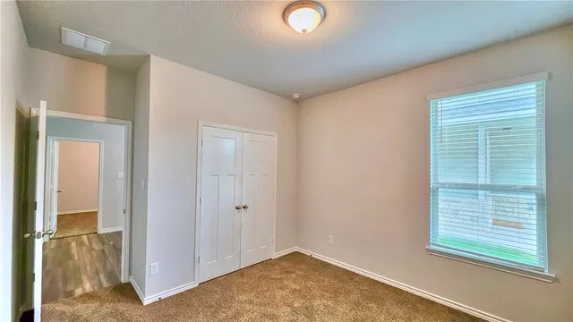 a view of an empty room with window