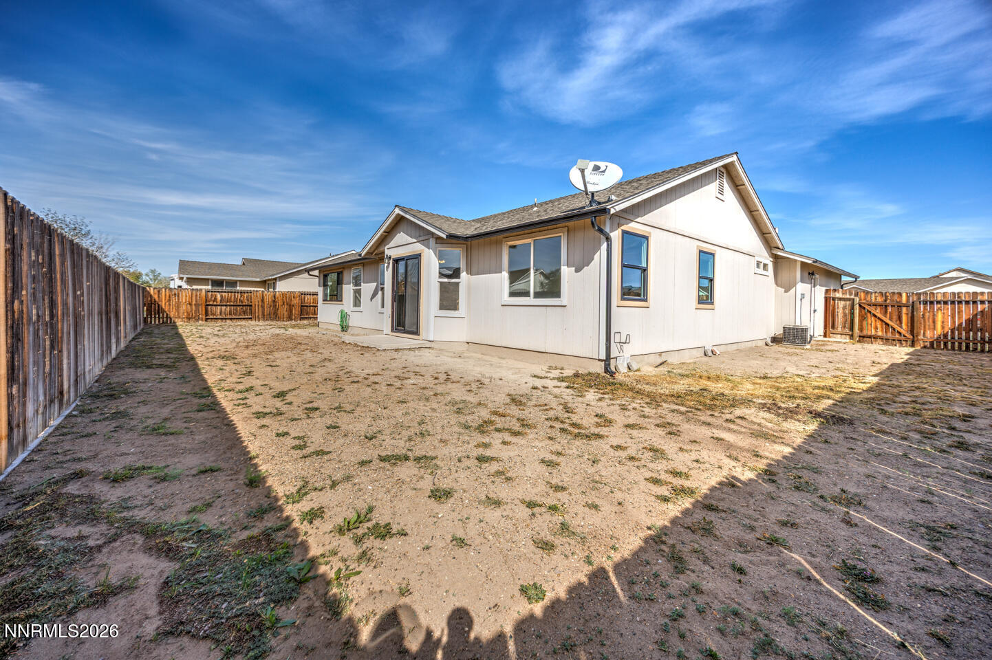 133 Prairie Lane Fernley, NV 89408 - Photo 20 of 22 a view of a house with a yard