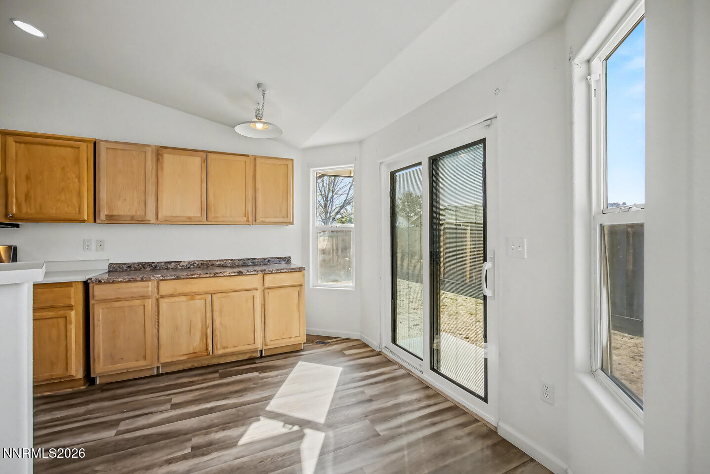 133 Prairie Lane Fernley, NV 89408 - Photo 6 of 22 a bathroom with a granite countertop sink and a bathtub