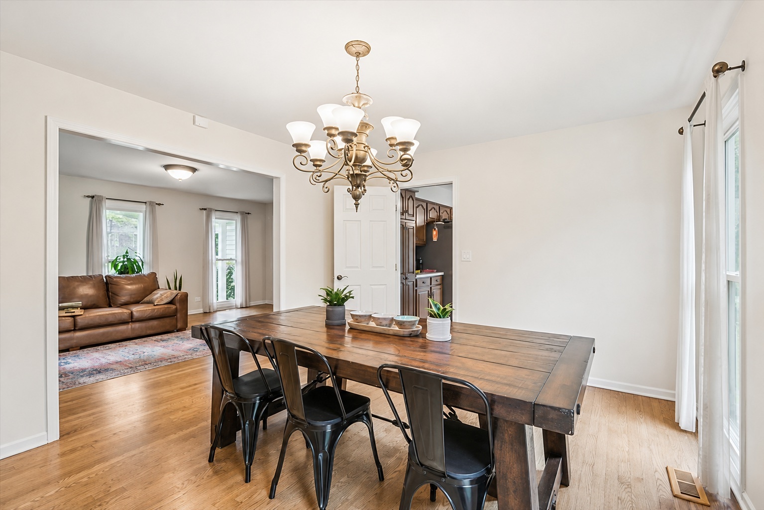 250 Wilshire Road Lake Forest, IL 60045 - Photo 5 of 28 a view of a dining room with furniture and wooden floor