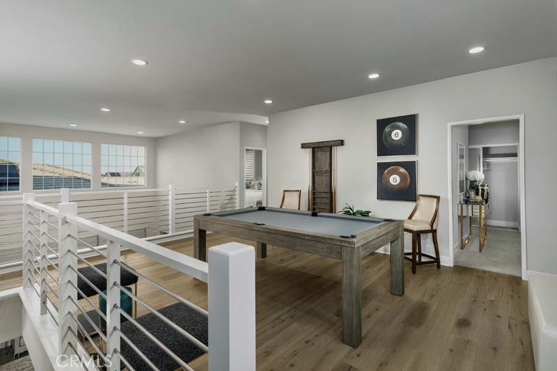 38924 Malva Rosa Drive Palmdale, CA 93551 - Photo 12 of 25 a room with wooden floor and furniture