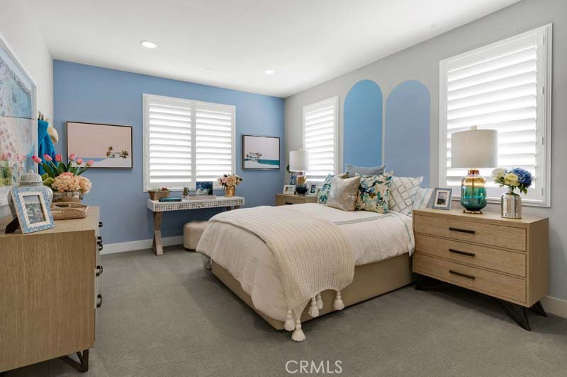 38924 Malva Rosa Drive Palmdale, CA 93551 - Photo 18 of 25 a bedroom with a bed and window