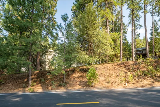 a view of a backyard of the house
