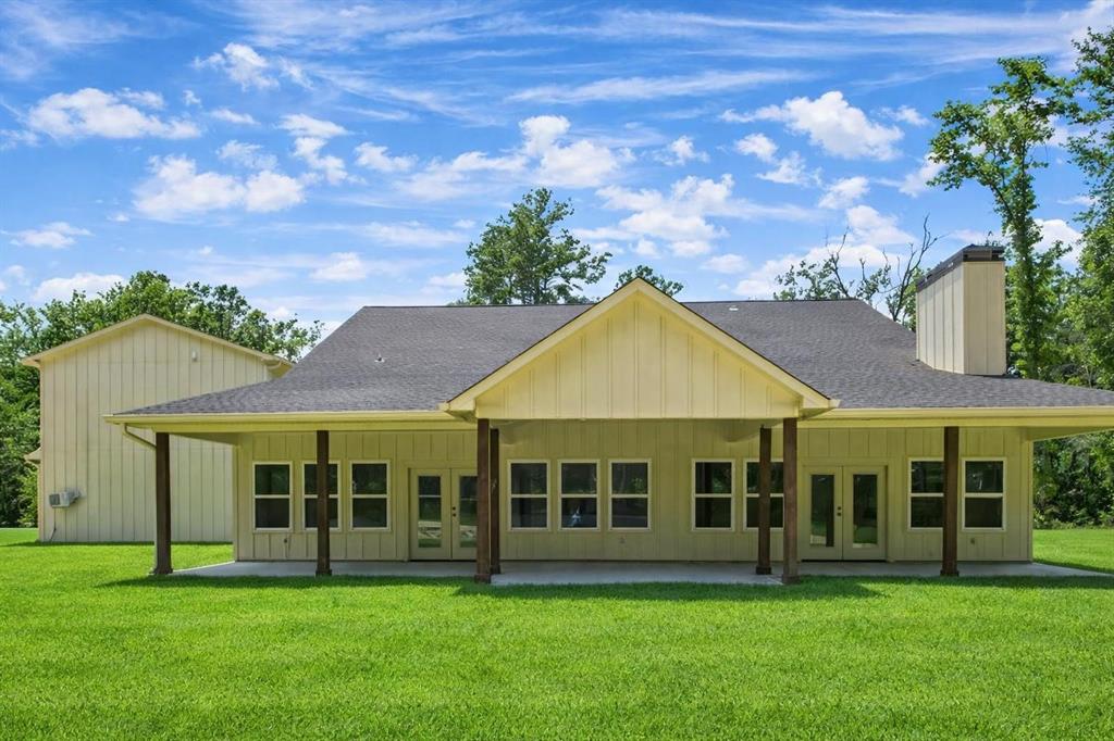 910 Cream Level Road Athens, TX 75751 - Photo 2 of 40 a view of a house with a garden