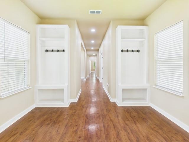 910 Cream Level Road Athens, TX 75751 - Photo 24 of 40 a view of a hallway with wooden floor