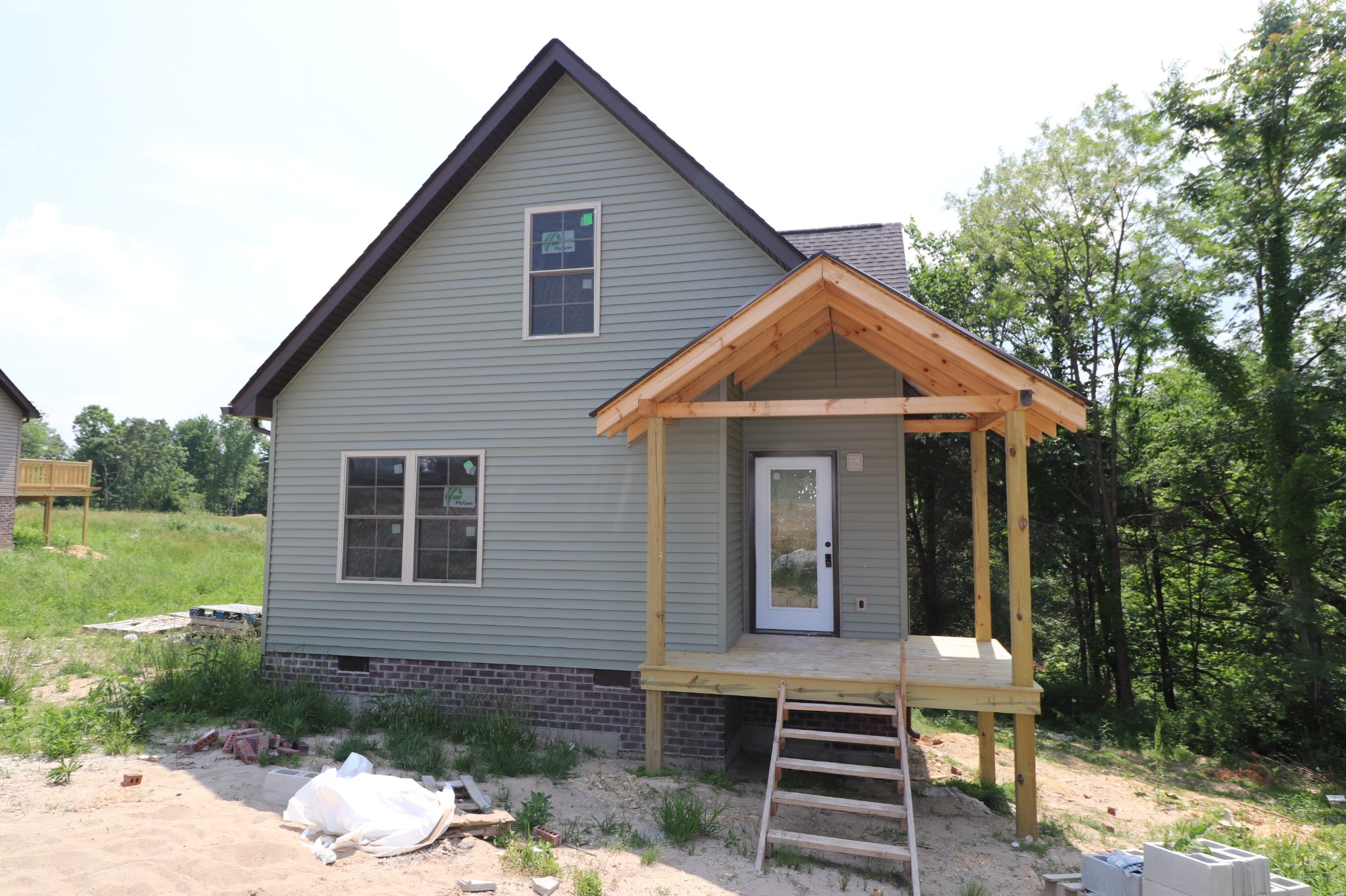 616 Kirbytown Road Lafayette, TN 37083 - Photo 6 of 6 a view of a house with a yard