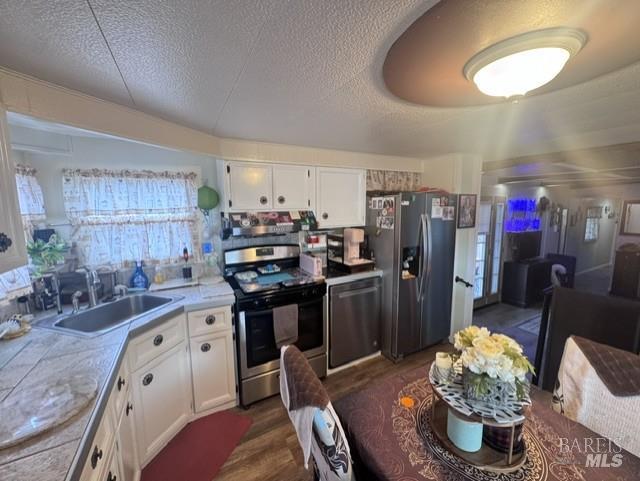 139 Coronado Circle Santa Rosa, CA 95409 - Photo 5 of 23 a kitchen with refrigerator and window