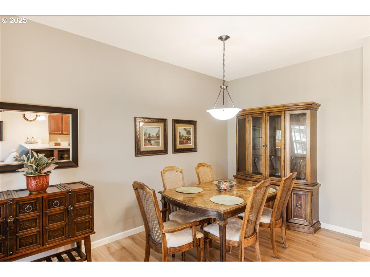 1258 Northwest Shattuck Way, Unit 309 Gresham, OR 97030 - Photo 13 of 33 a view of a dining room with furniture