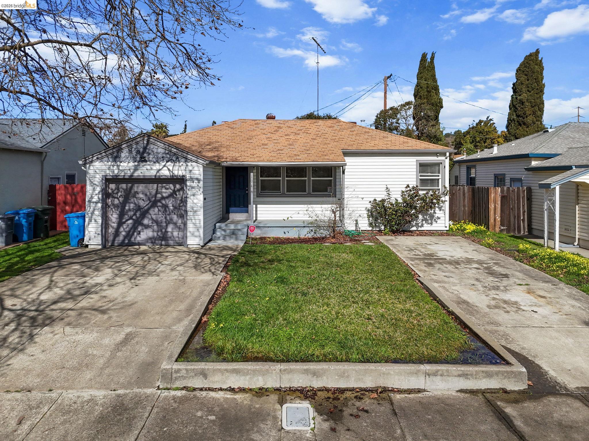 104 Foster Street Vallejo, CA 94591 - Photo 1 of 34 a front view of a house with a yard