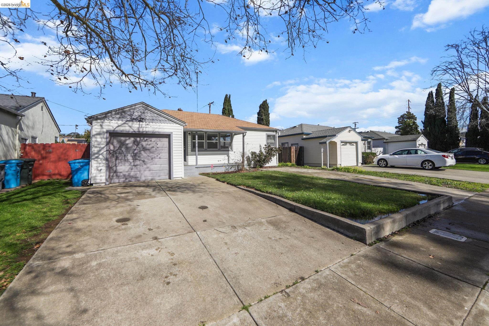 104 Foster Street Vallejo, CA 94591 - Photo 11 of 34 a front view of a house with a yard