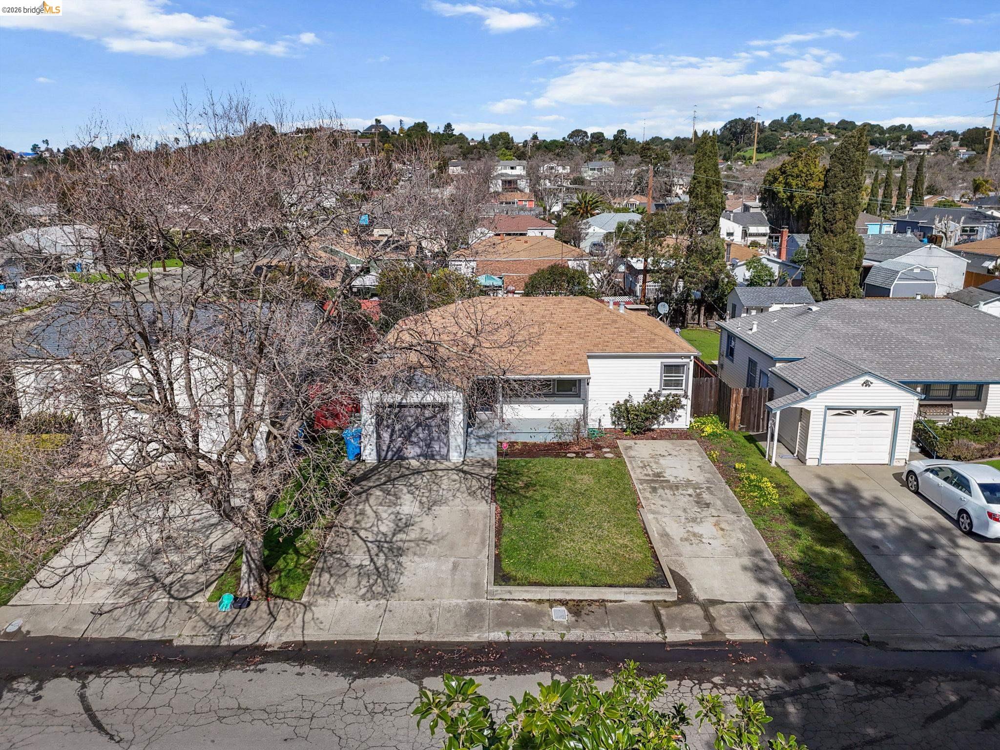 104 Foster Street Vallejo, CA 94591 - Photo 2 of 34 a front view of a house with a yard