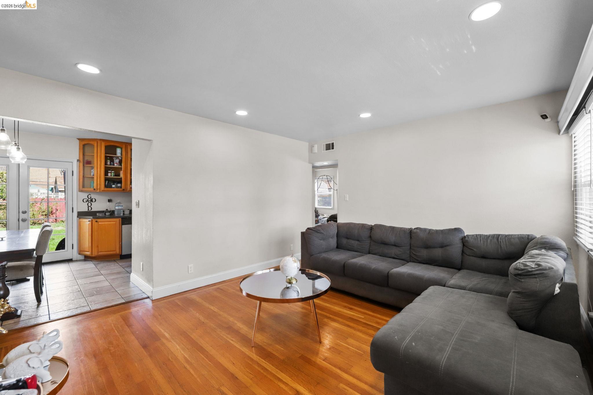 104 Foster Street Vallejo, CA 94591 - Photo 21 of 34 a living room with furniture and wooden floor