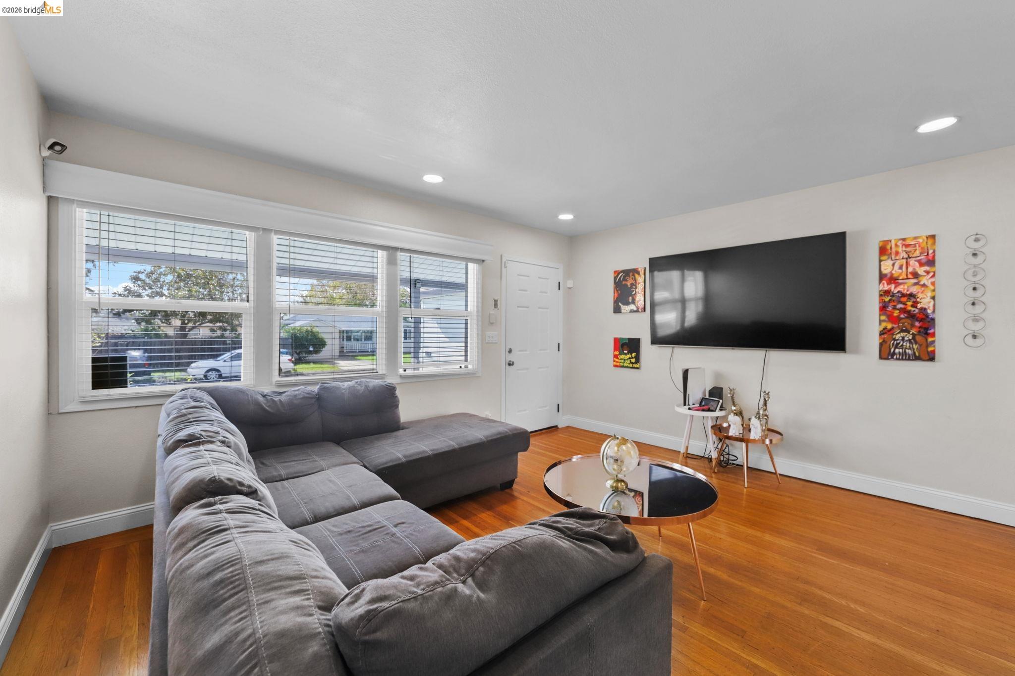 104 Foster Street Vallejo, CA 94591 - Photo 22 of 34 a living room with furniture and a flat screen tv