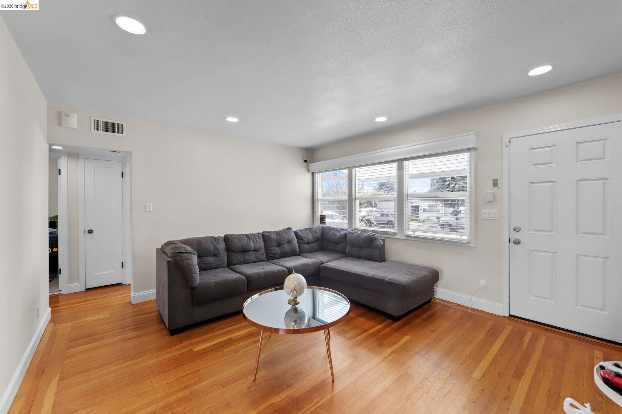 104 Foster Street Vallejo, CA 94591 - Photo 23 of 34 a living room with furniture and a window